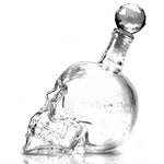 Bouteille en verre tête de mort gothique